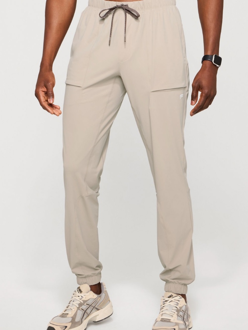 Fabletics Men's The One Jogger Pants Khaki Small  Zip Pockets Cuffed Lightweight